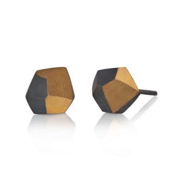 The geometric design looks great with the bold contrast of oxidised silver and gold, perfect for everyday wear.