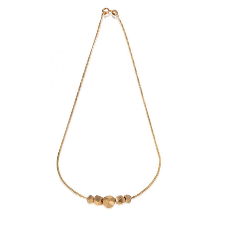 A unique and elegant necklace, inspired by the facets in natural rock formations. The gold nuggets give the dainty necklace a luxurious weight.