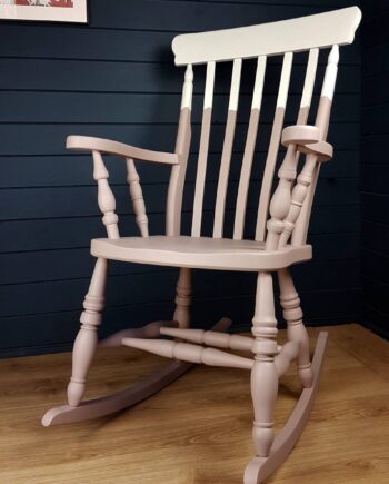 Two-tone pink and white painted wooden rocking chair