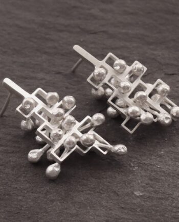Kinetic large silver stud Statement earrings, style 2.