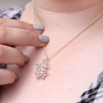 Kinetic small fidget silver pendant, style 1.