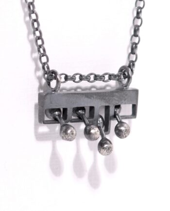 Kinetic mini fidget silver pendant
