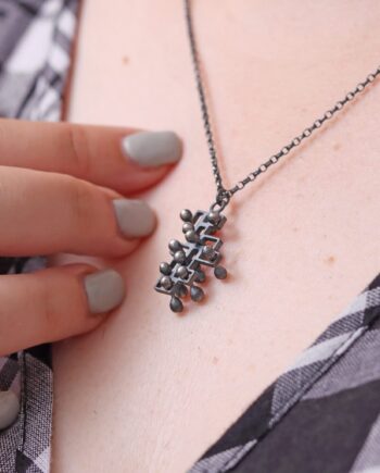Kinetic small fidget silver pendant, style 2.