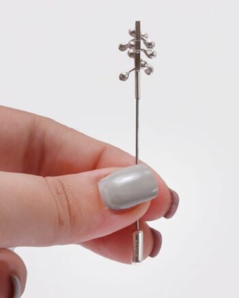 Kinetic silver brooch pin
