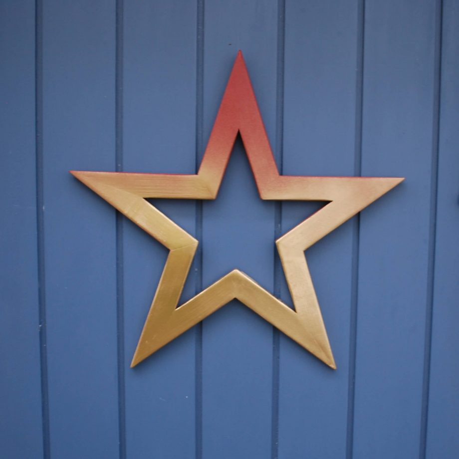 Gold and red painted wooden star wreath