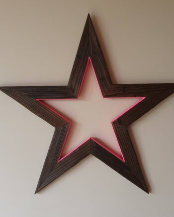 Charred wooden star wreath with neon pink highlight