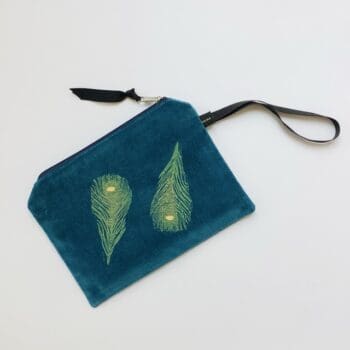 Luxury Teal Velvet Zip Up Pouch with yellow Peacock Feathers hand printed design with golden shimmer and with Black Grosgrain hand strap