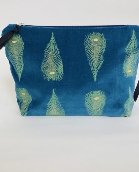 Luxury teal velvet makeup bag with yellow peacock feathers print with golden shimmer