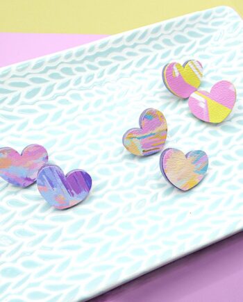 Unique set of 3 pairs of handmade heart-shaped earrings with a pastel abstract designs, by Sophie Kate Creates.