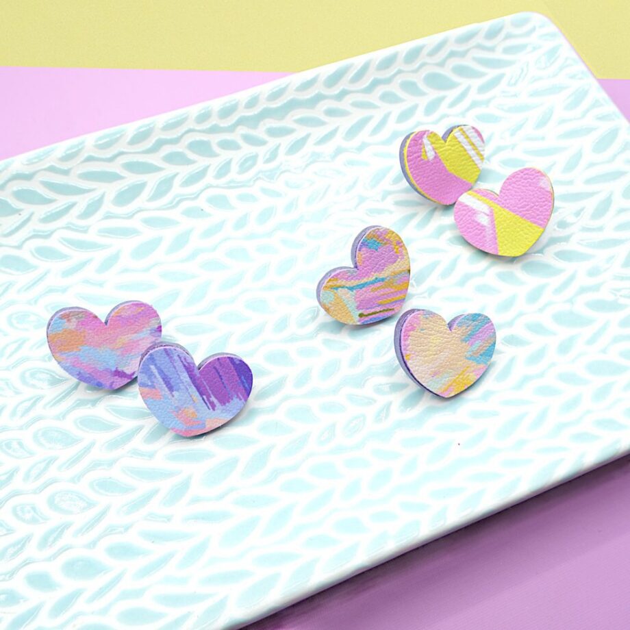 Unique set of 3 pairs of handmade heart-shaped earrings with a pastel abstract designs, by Sophie Kate Creates.