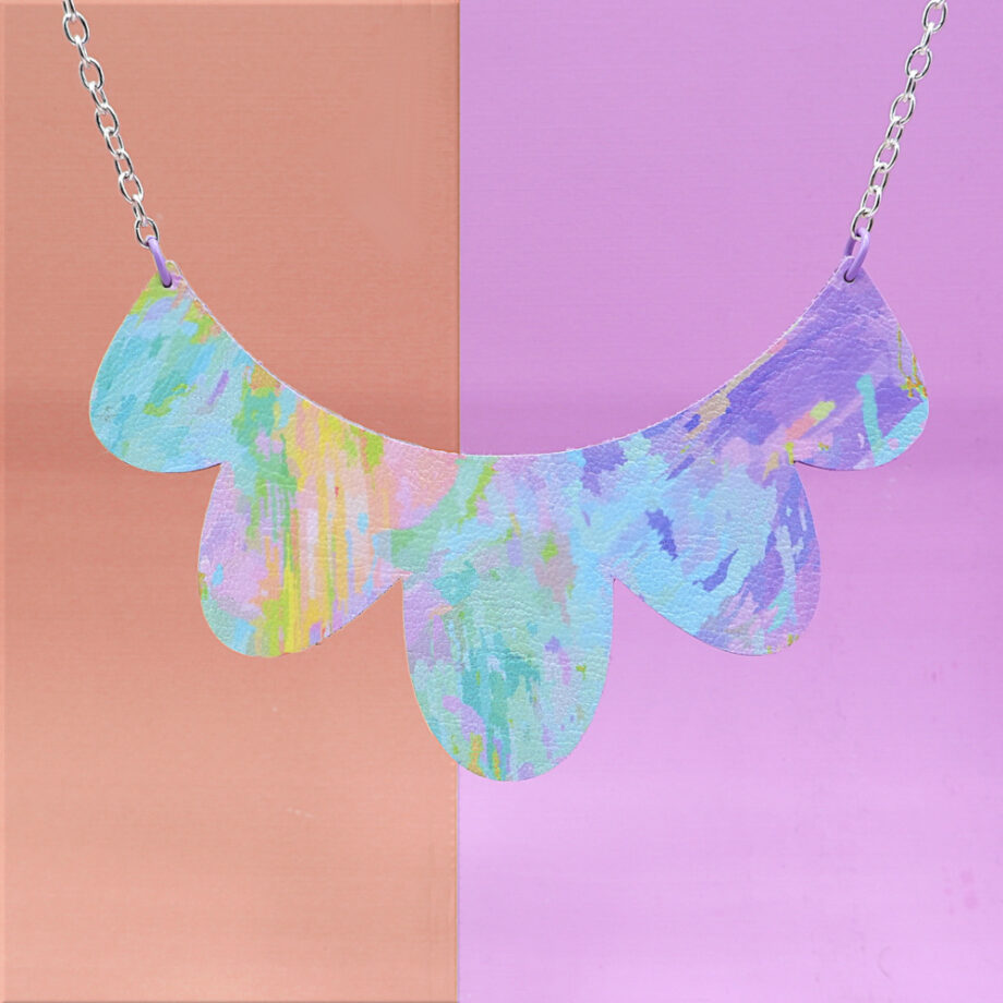 Unique pastel abstract necklace, handcrafted with original artwork printed on faux leather with wood base and genuine silver-plated chain.