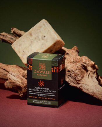 Authentic African black soap bar made with raw shea butter, showing natural texture and earthy color
