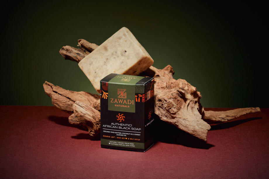 Authentic African black soap bar made with raw shea butter, showing natural texture and earthy color