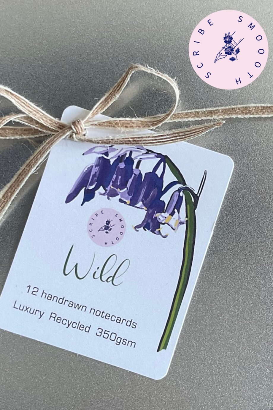 The Wild collection label attached to a jute ribbon