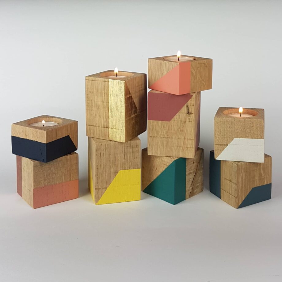 Colourful mix of wooden tealight holders