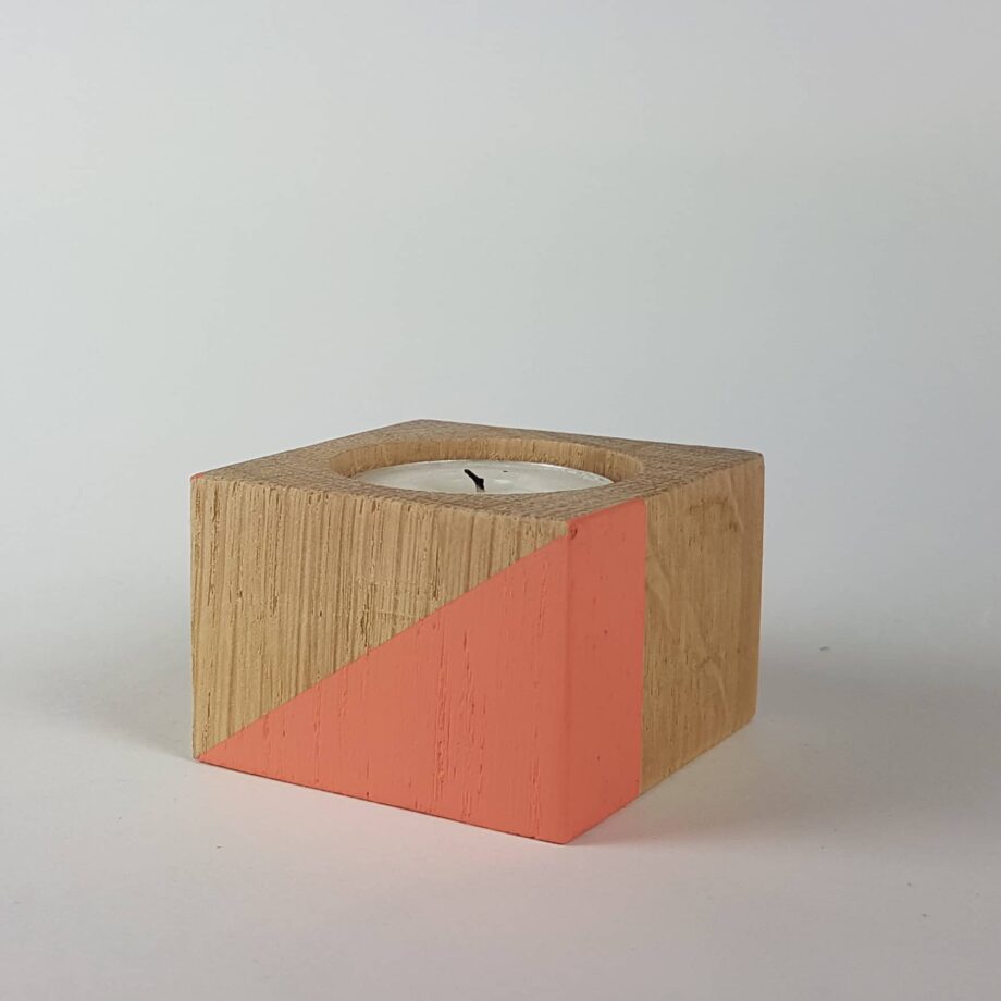 Coral coloured geometric shapes painted wooden candle holder
