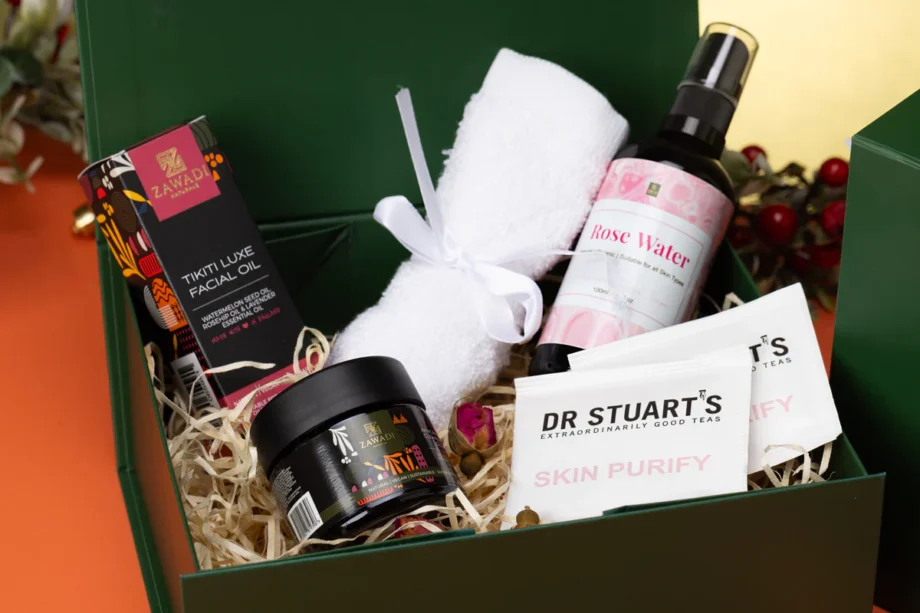 Spoil Her Self Love Gift Box featuring Makeda Glow Pot, Tikiti Luxe facial oil, a bamboo face towel, skin teas and natural skincare treats beautifully arranged in a box