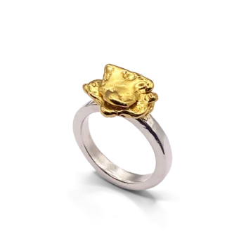 Studio shot of sterling silver flower ring with organic petal texture