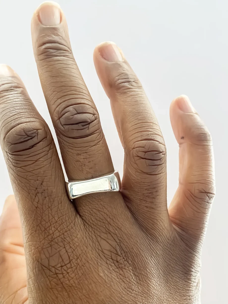 Recycled silver Asymmetric Grace Bow Ring worn on hand, showing natural fit and shine