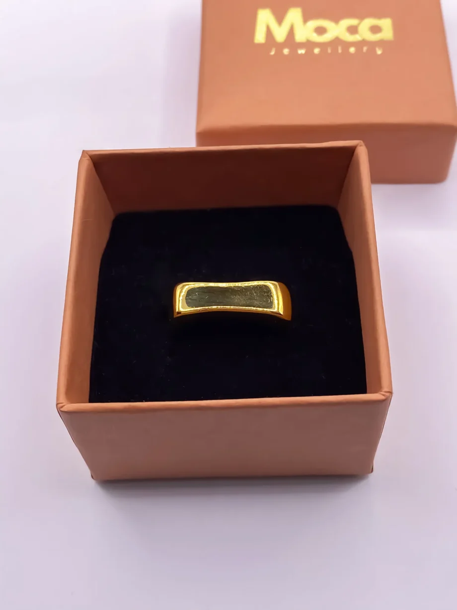 Gold Asymmetric Grace Bow Ring presented in jewellery box