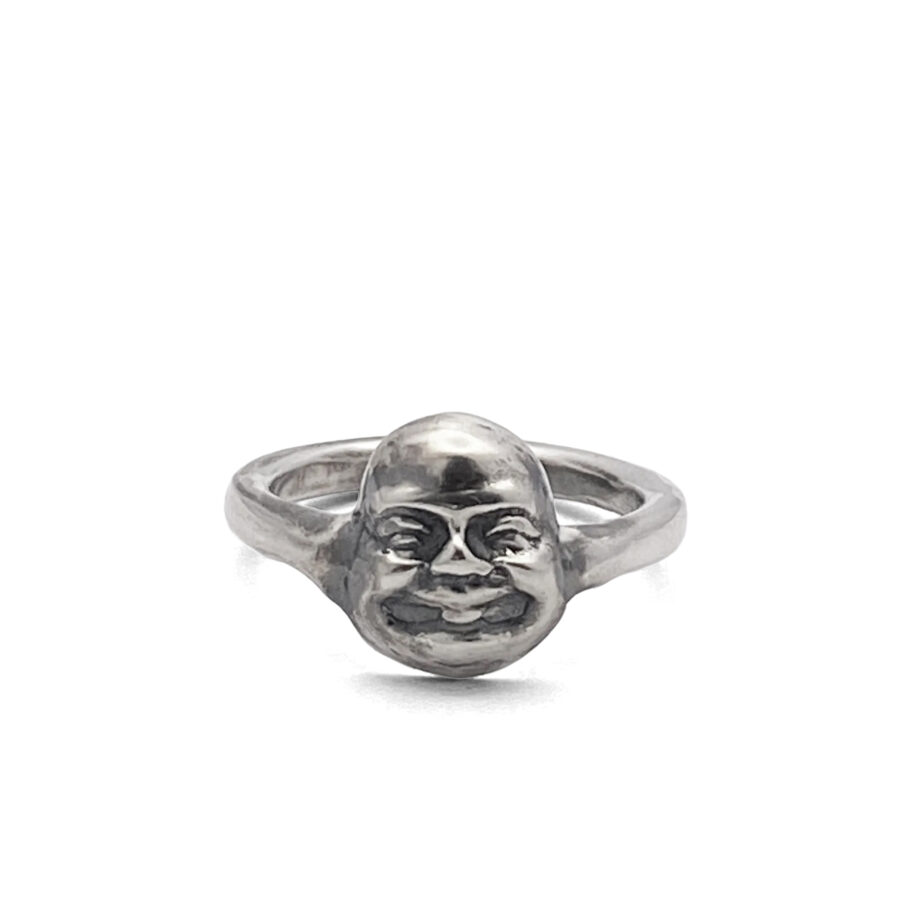 Front view of handcrafted Buddha Face Ring in oxidised silver on white background