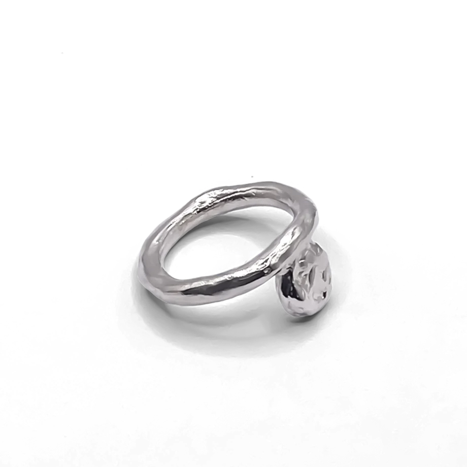 Sterling silver Circle Accent Ring with smooth circular face on a white background