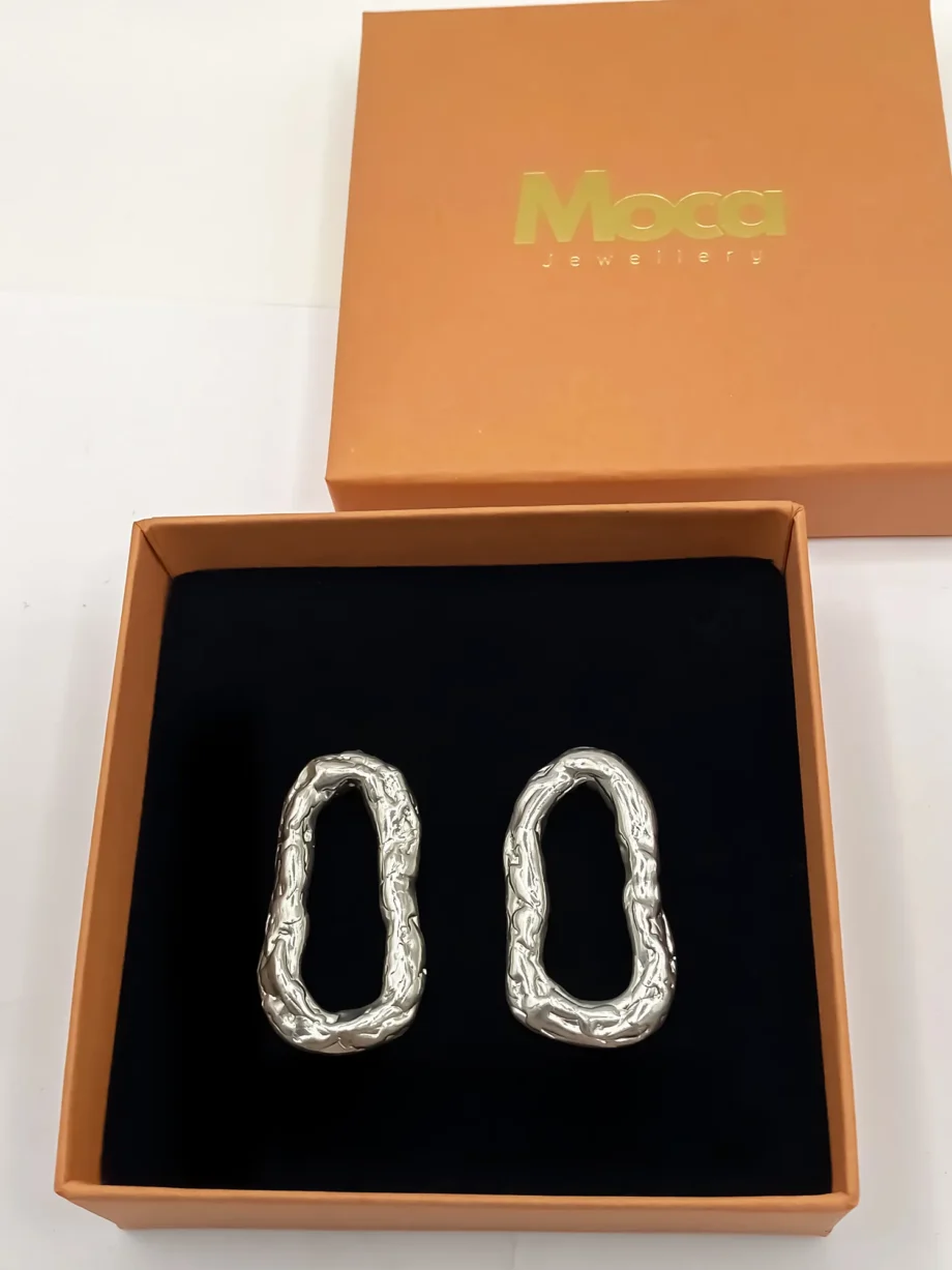 Silver Flow Loop Earrings displayed in jewellery box with branded packaging