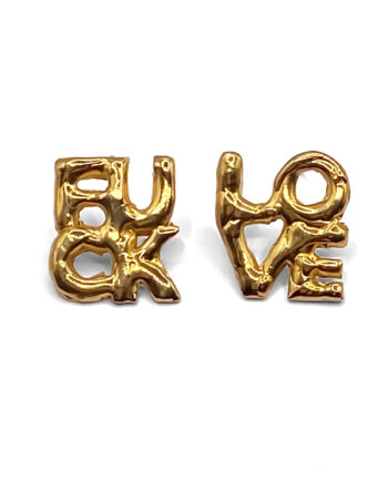 Gold ‘FUCK’ and ‘LOVE’ earrings laid flat on white background