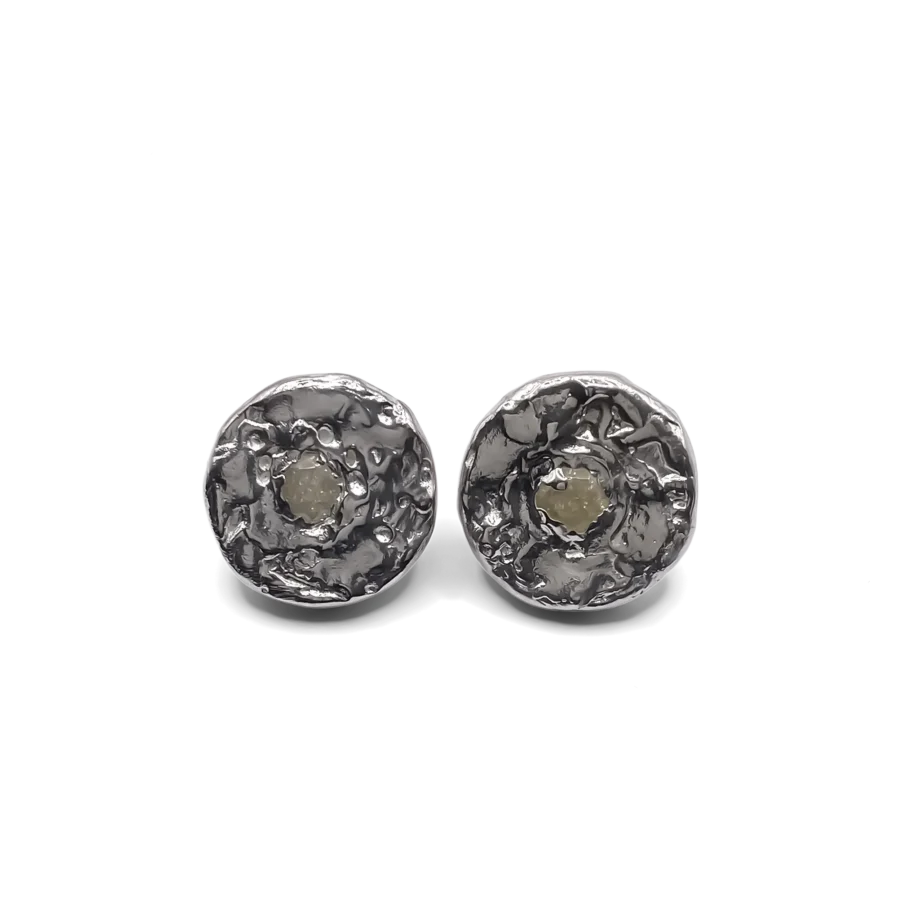 Pair of Grain Circle Stud Earrings on white background