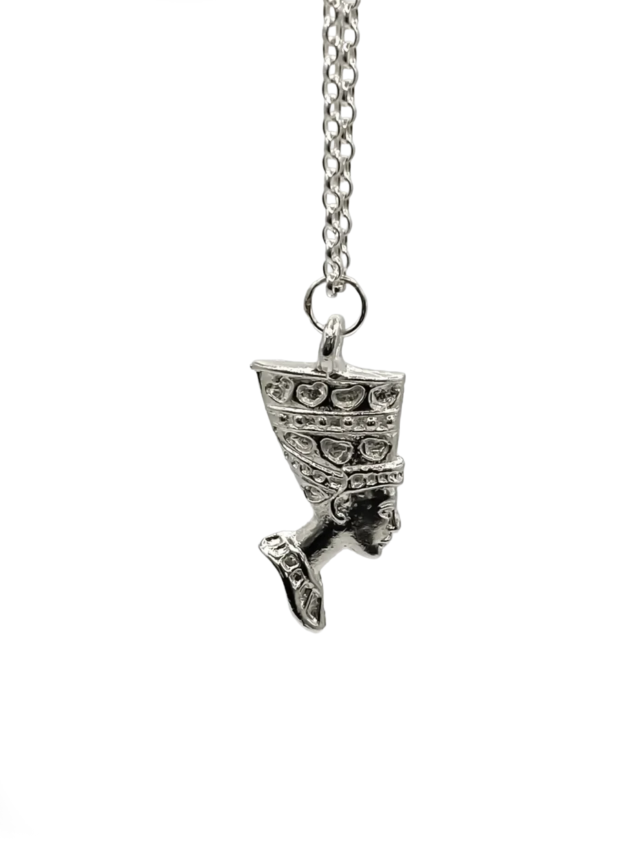 Gold Nefertiti necklace worn with a denim jacket