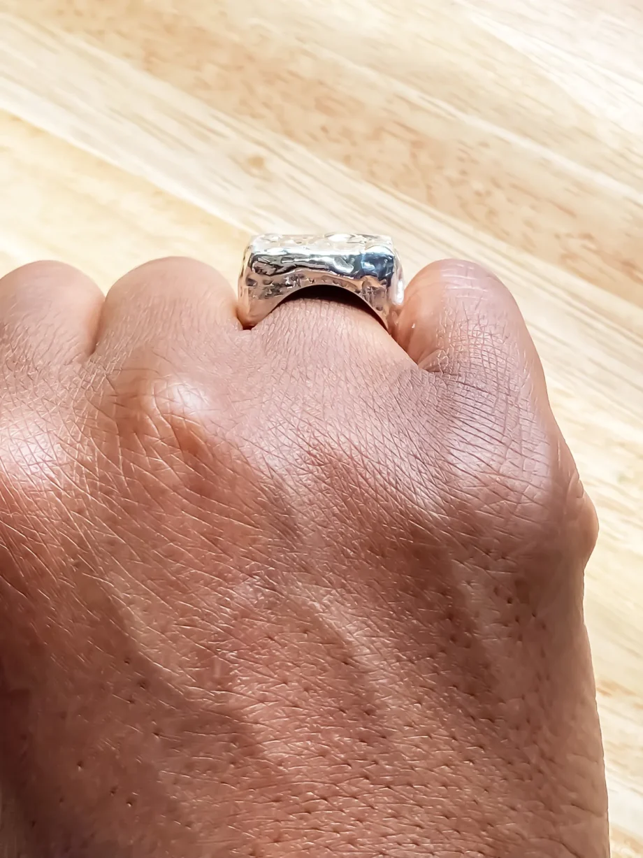 Rosa Signet Ring close up on hand showing texture detail and fit