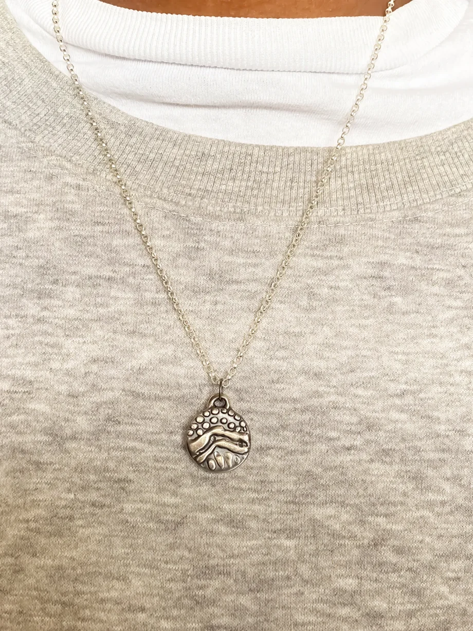 Wavy Detail Pendant worn on model with light jumper
