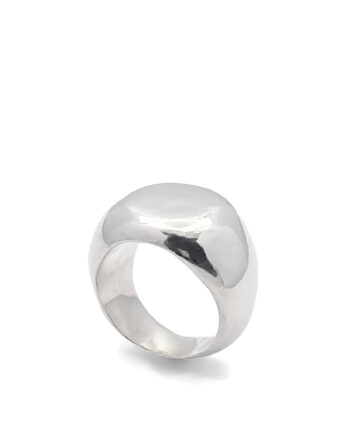 Angled view of a silver round signet ring on a white background.