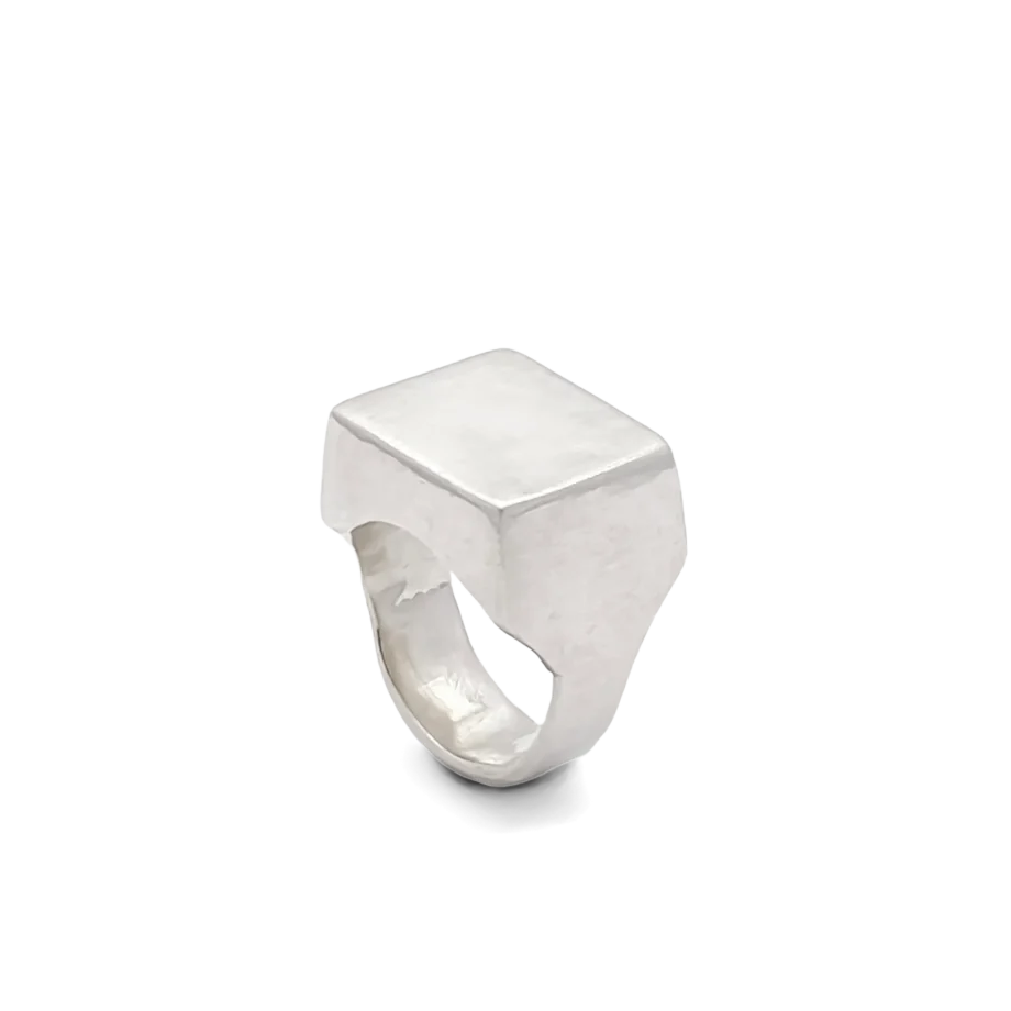 Single sterling silver square signet ring displayed on a white background