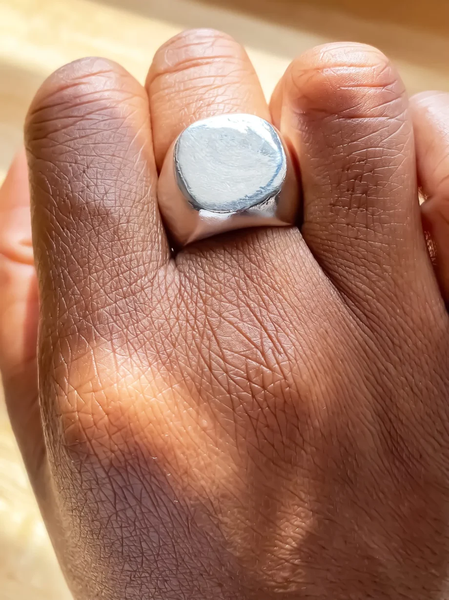Square-Round Signet Ring worn on hand, front view
