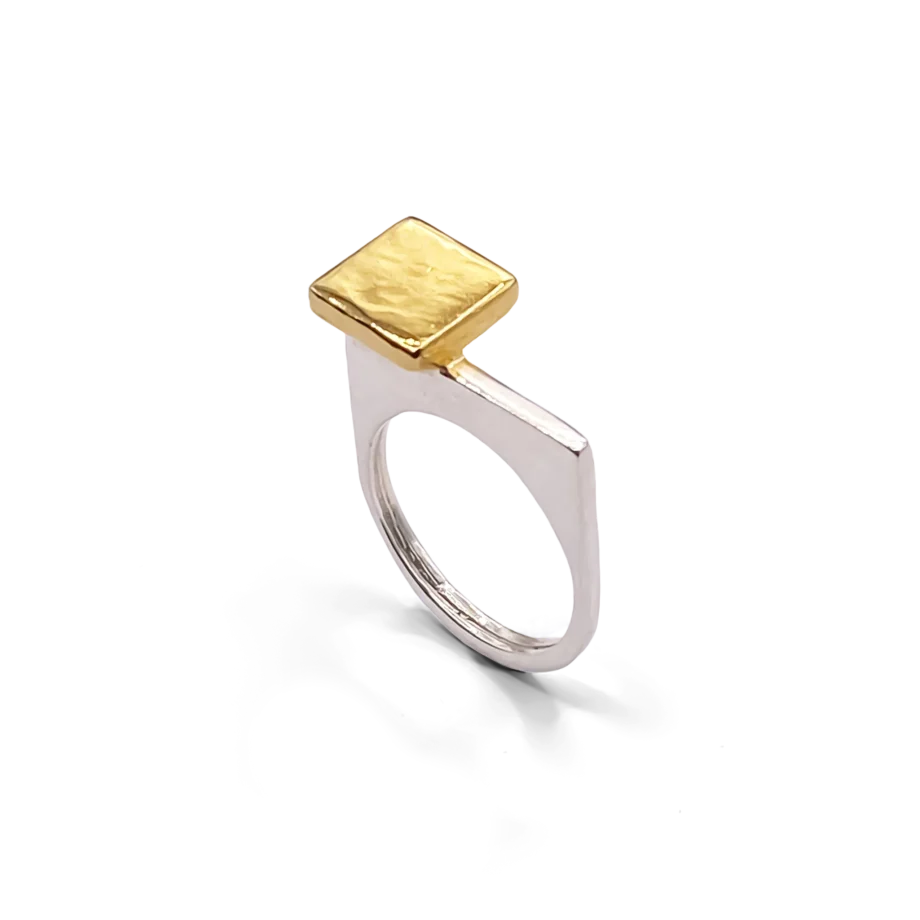 angled view of square-top signet ring with gold vermeil face