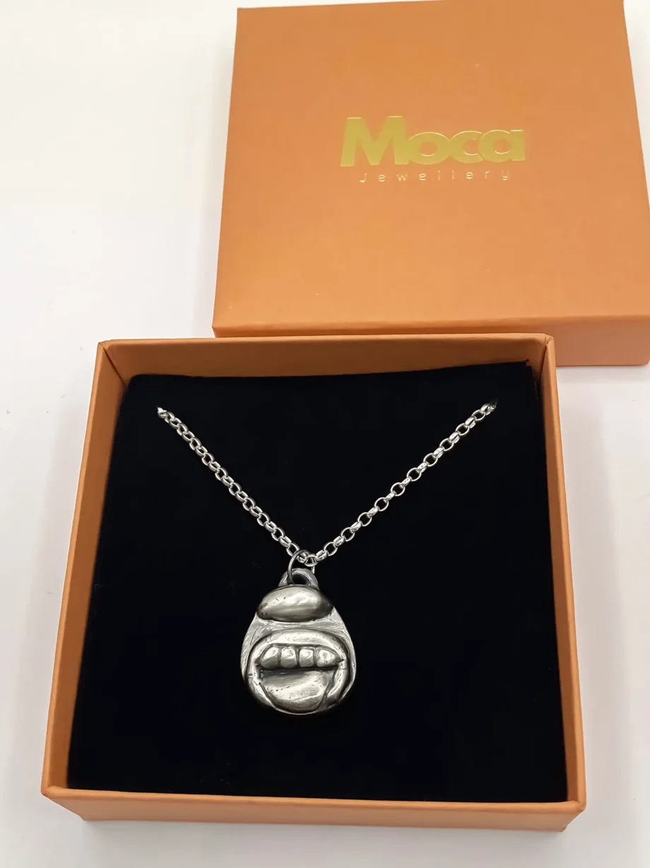 Tongue & Teeth Pendant in gift box with Moça Jewellery branding