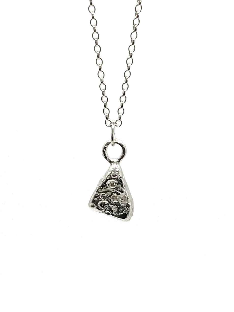 Silver triangular pendant with gemstone accents on chain.