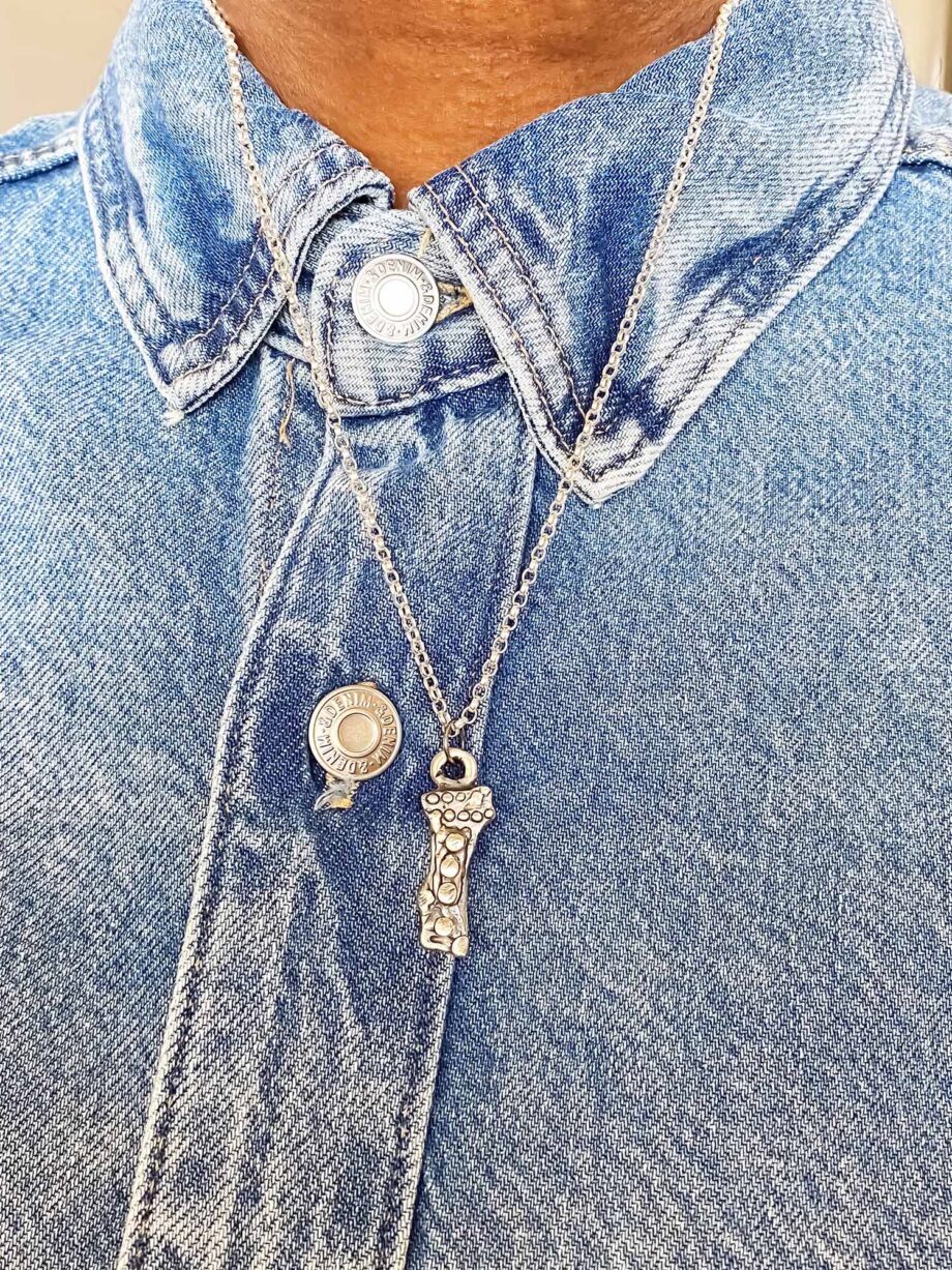 Twig Pendant worn over denim shirt