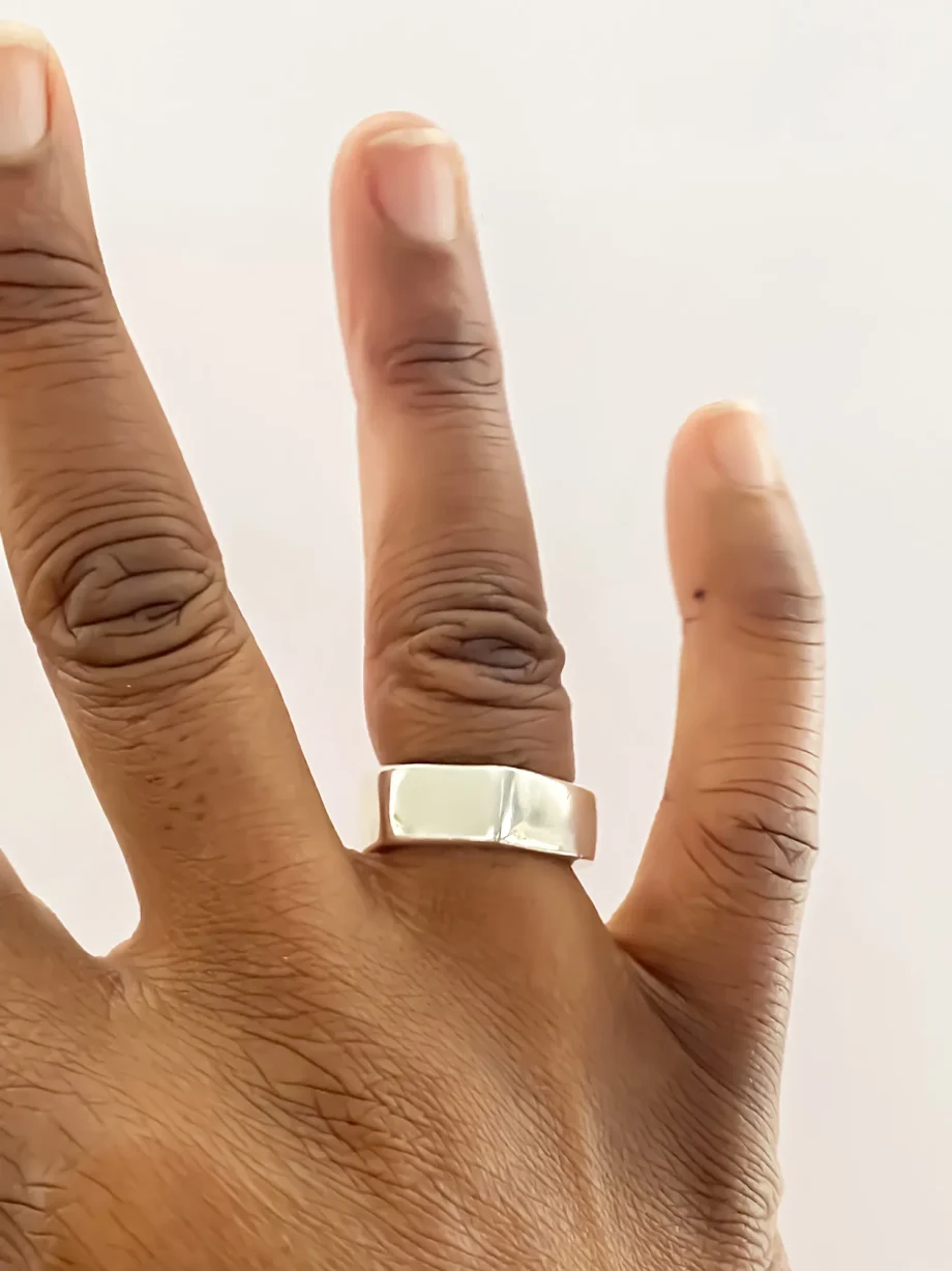 Wonky Nut Ring worn on a hand, shown upright