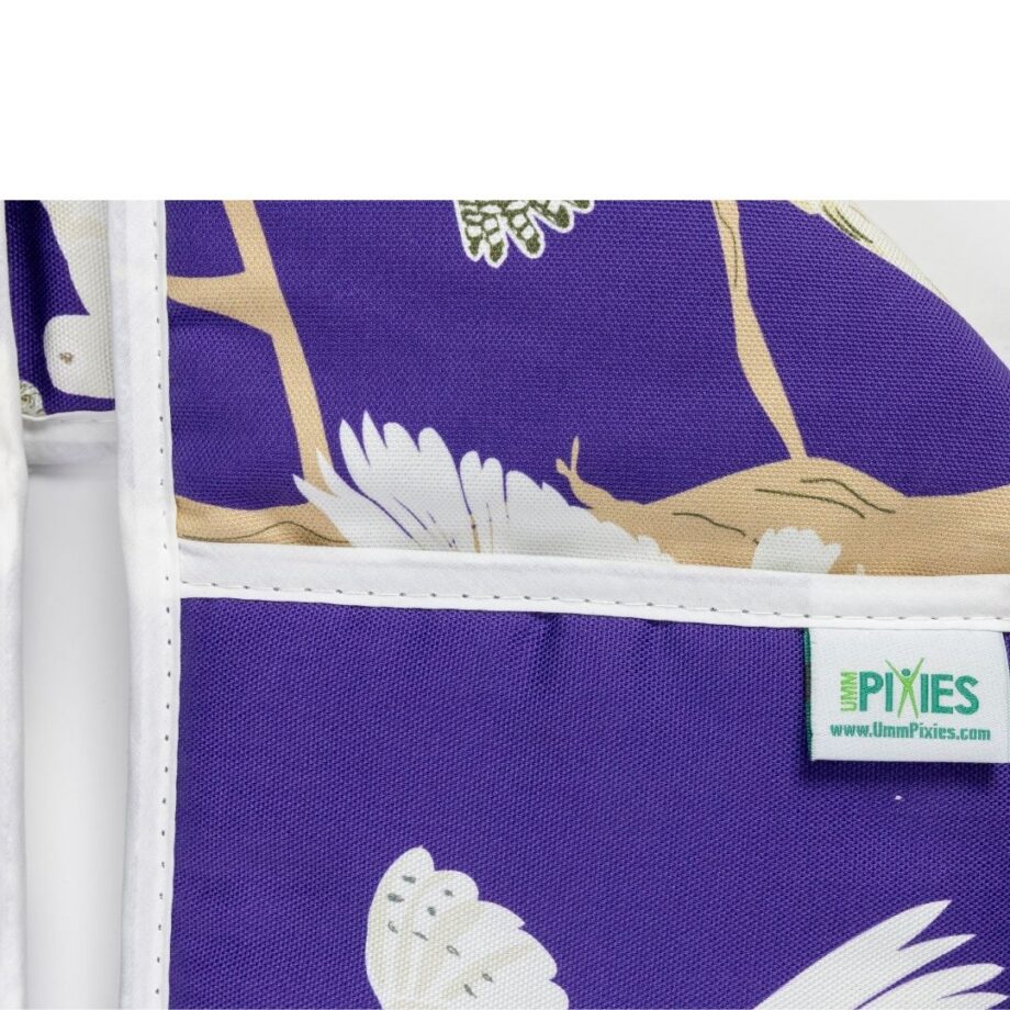 close up of UmmPixies brand label on Owl design oven gloves