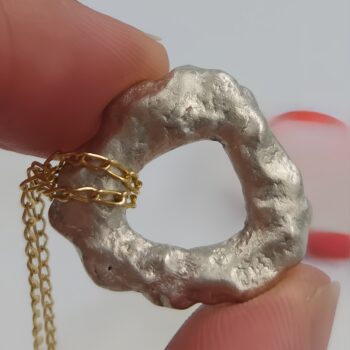 Molten Flow: Irregular Silver Circle Pendant