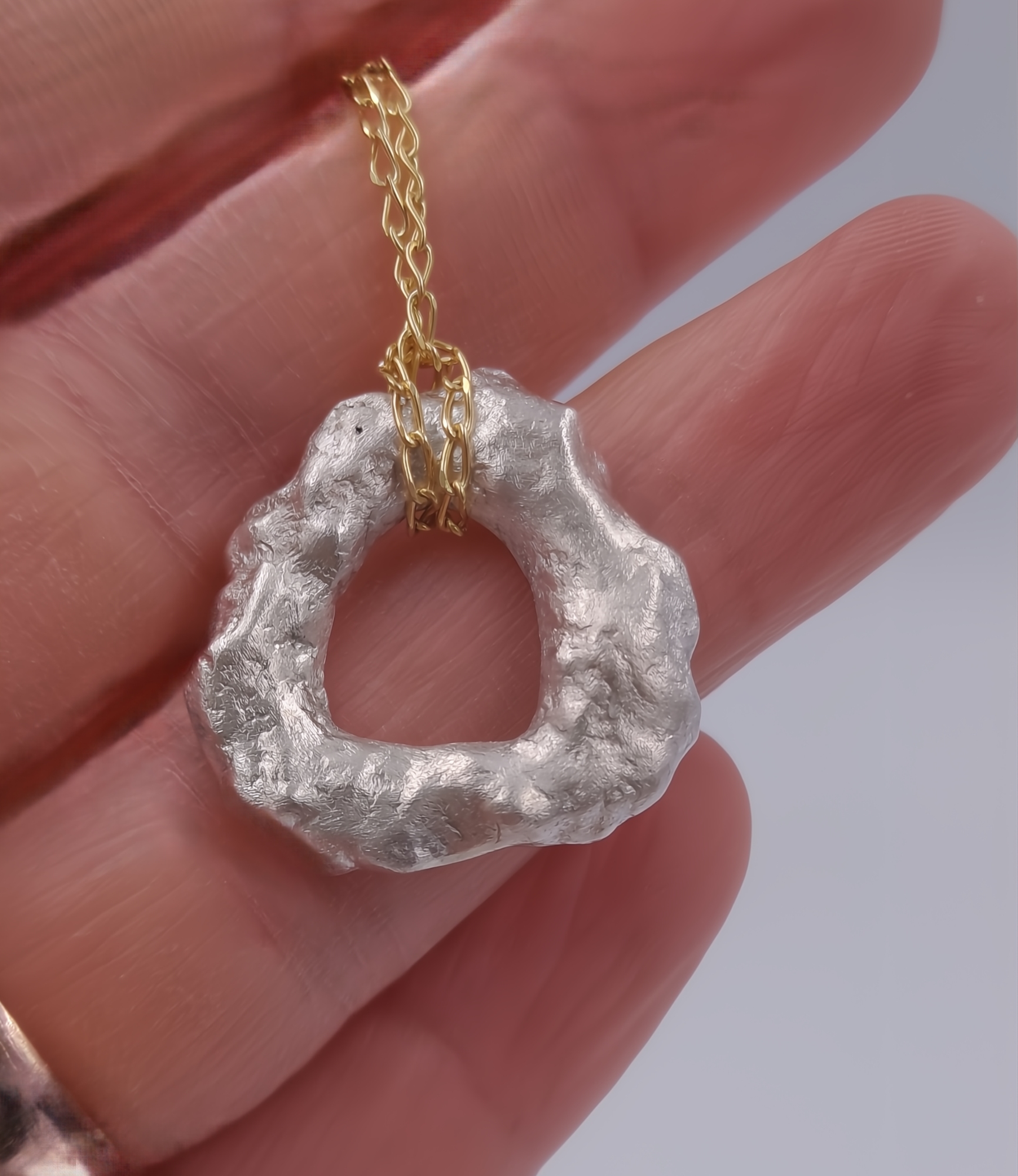 Molten Flow: Irregular Silver Circle Pendant