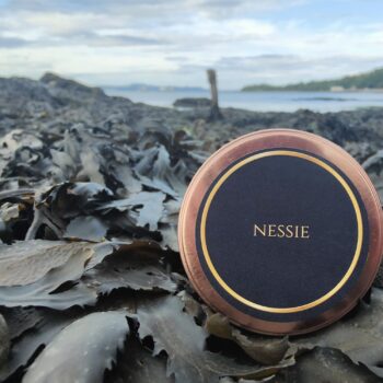 Loch Ness Monster candle - Bonnie Glow Scottish luxury scented candle with Nessie design