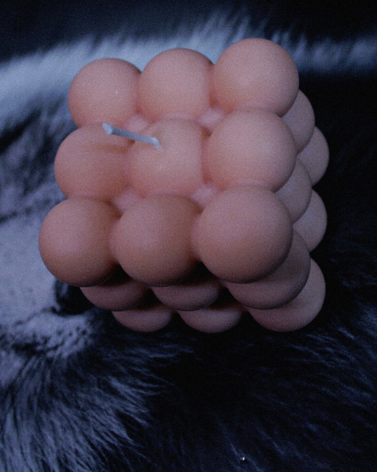 Light pink Lavender scented bubble candle with a postcard with a black cat in the background