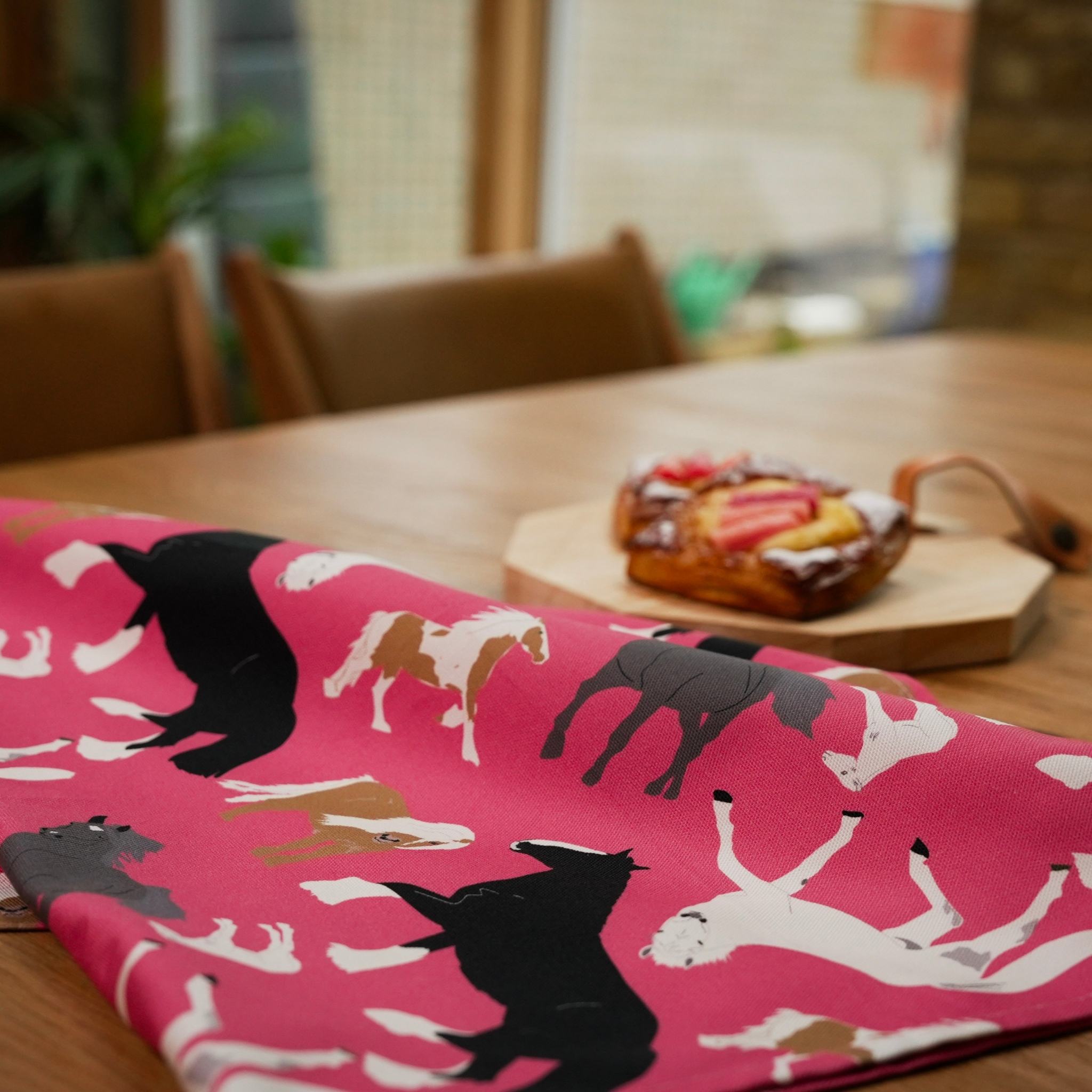 Pink organic cotton teat towel with horses illustrations